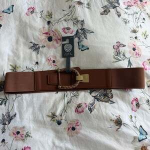 Vince Camuto Circle and Bar Toggle Stretch Waist Belt
